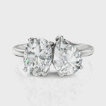 Load and play video in Gallery viewer, Oval Cut &amp; Pear Cut Toi Et Moi Solitaire Diamond Ring (1.50 CT. Each Diamond)
