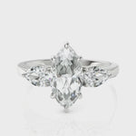 Load and play video in Gallery viewer, Classic Three Stone Marquise Cut &amp; Pear Cut Diamond Solitaire Ring (1.50 CT. Marquise Cut)
