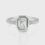 Load and play video in Gallery viewer, Bezel Set Emerald Cut Solitaire Engagement Ring (1.00 CT. Solitaire)
