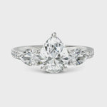 Load and play video in Gallery viewer, Brilliant Three Stone Pear Cut Diamond Engagement Ring (Center Stone 1.50 CT.)
