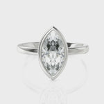 Load and play video in Gallery viewer, Striking Marquise Cut Diamond Solitaire Ring With Bezel Set (1.50 CT.)
